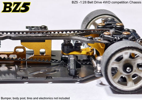 Atomic RC Z5 Belt Drive 4WD chassis kit with black and silver components, showing the detailed RC car frame and suspension parts.