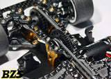 Atomic RC Z5 Belt Drive 4WD RC chassis kit with detailed components and black and silver construction for off-road racing.