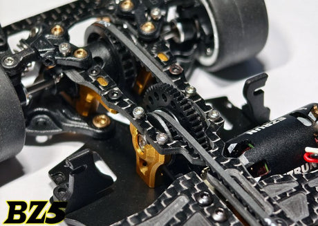 Atomic RC Z5 Belt Drive 4WD RC chassis kit with detailed components and black and silver construction for off-road racing.