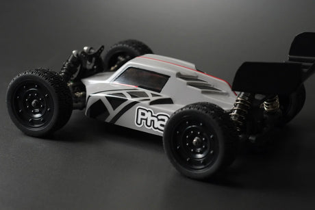 RC buggy body by Phat Bodies for 190mm wheelbase, featuring a sleek design and detailed graphics for model car racing.