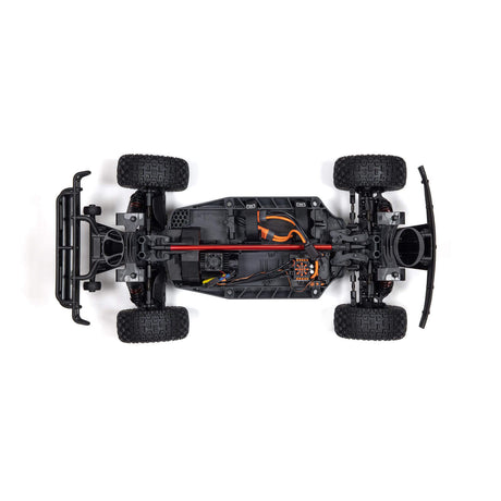 ARRMA 1/8 Mojave 4S 4X4 RTR desert truck with rugged off-road tires and detailed desert-themed body in an outdoor setting