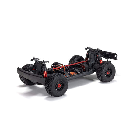 ARRMA 1/8 Mojave 4S 4x4 RTR desert truck, detailed orange and black off-road RC vehicle with rugged tires and suspension.