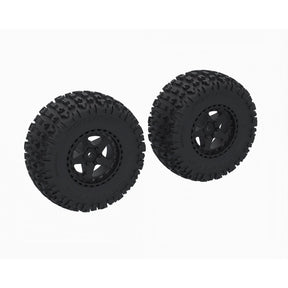 Pair of ARRMA DBOOTS Fortress SC mounted tires for off-road RC trucks, showing tread pattern and rubber construction.