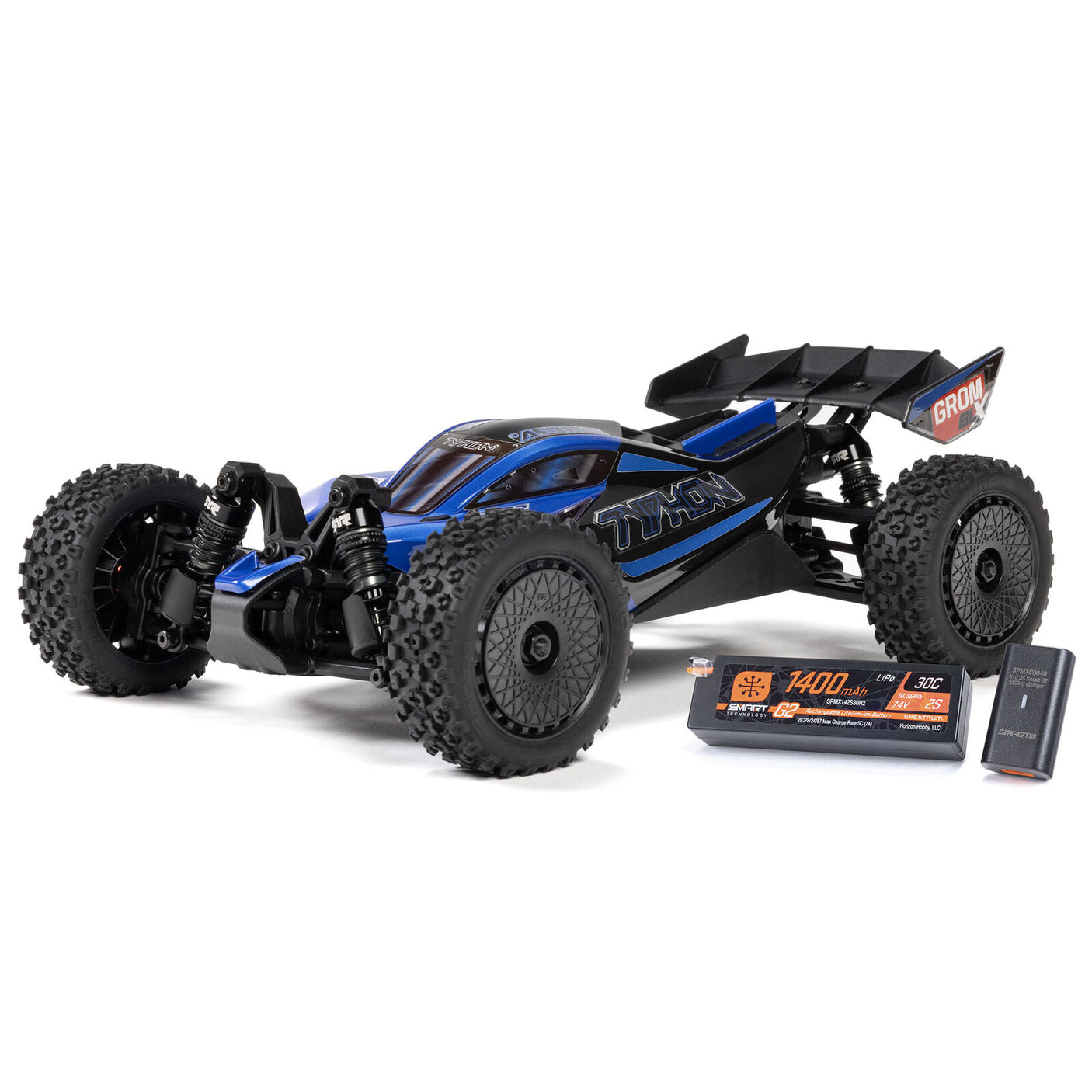 ARRMA 1/14 Typhon GROM 223S DSC 4X4 RTR brushless buggy on a track, showcasing its rugged design and vibrant blue and black body.