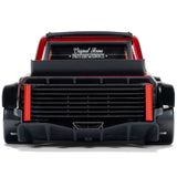 ARRMA 1/12 Infraction GROM 3S BLX 4x4 brushless street truck with battery and charger, shown on a smooth surface.