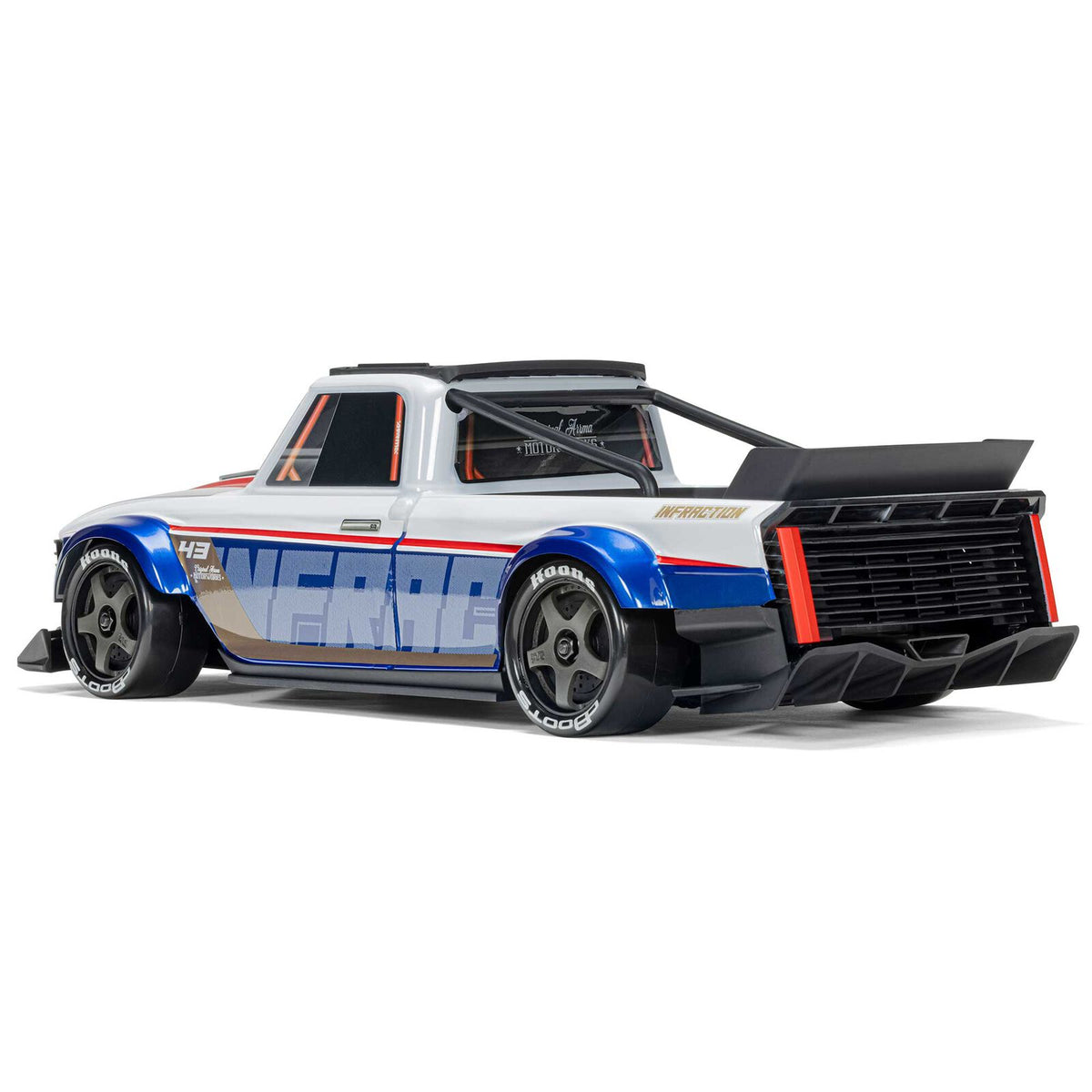 ARRMA 1/12 Infraction GROM 3S BLX 4x4 brushless street truck on road, showing detailed body and large tires.