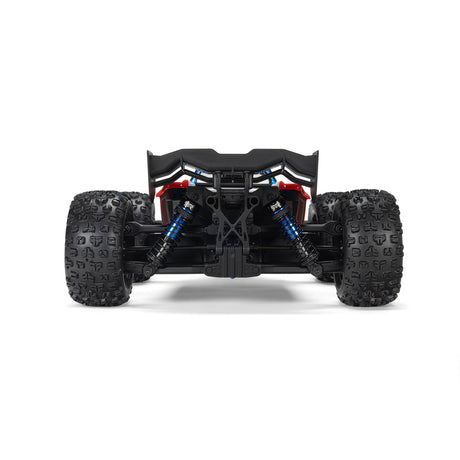 ARRMA 1/16 Mini Kraton 3S RC car with charger and battery, detailed close-up showing the rugged off-road design
