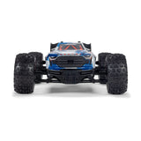 ARRMA 1/16 Mini Kraton 3S RC car with charger and battery, shown on a smooth surface with detailed body design.