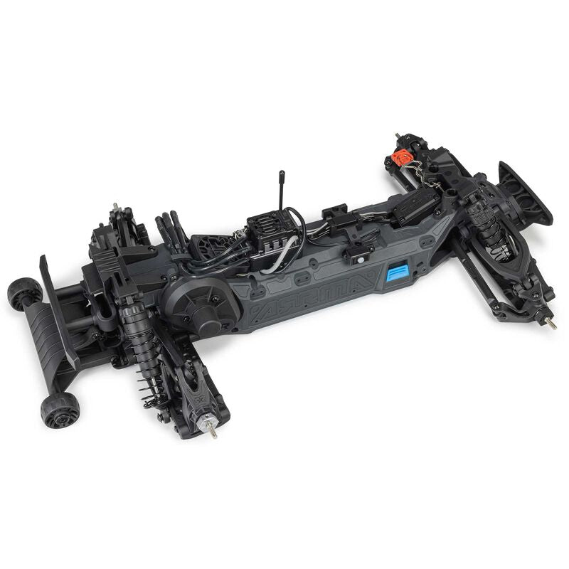 ARRMA 1/10 Vorteks 223S DSC 2WD RTR brushless stadium truck on a track, showcasing its sporty design and off-road tires.