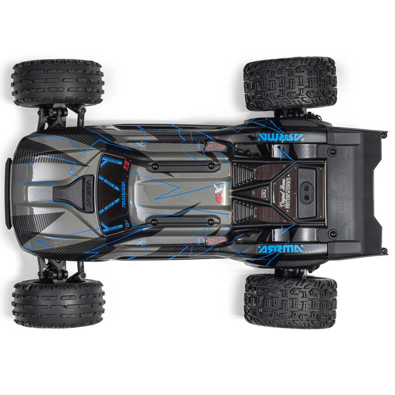 ARRMA 1/10 Vorteks 223S DSC 2WD RTR brushless stadium truck, shown in a vibrant outdoor racing scene