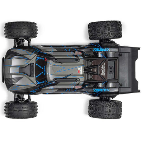 ARRMA 1/10 Vorteks 223S DSC 2WD RTR brushless stadium truck, shown in a vibrant outdoor racing scene
