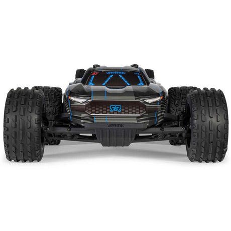 ARRMA 1/10 Vorteks 223S DSC 2WD RTR brushless stadium truck on track with detailed body and off-road tires.