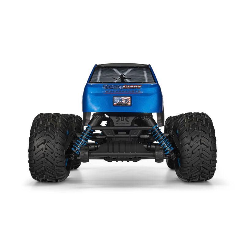 ARRMA 1/10 scale Freedom Flyer 223s 2WD brushless monster truck with rugged tires and sleek blue and black body design.
