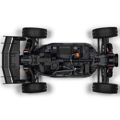 ARRMA 1/8 scale Typhon 4x4 RTR brushed buggy on rugged terrain with detailed body and large off-road tires.