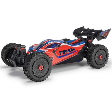 ARRMA 1/8 Typhon 4x4 RTR brushed buggy on rugged terrain, showcasing its powerful off-road design and vibrant orange and black body.