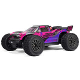 ARRMA 1/10 VORTEKS 223S DSC 4x4 RTR brushless stadium truck on a track, showcasing its detailed design and rugged build.
