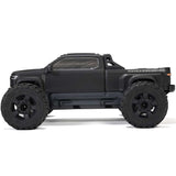 ARRMA 1/10 scale Big Rock 223S DSC 4x4 RTR brushless monster truck on rugged terrain, showcasing its powerful off-road design