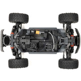 ARRMA 1/10 scale Big Rock 223S DSC 4x4 RTR brushless monster truck on rugged terrain, showcasing its durable design and powerful build.