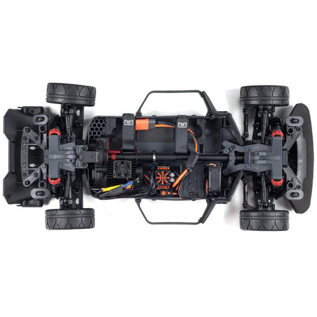 ARRMA 1/8 Infraction 3S 4X4 RC truck with orange and black body, detailed chassis, and off-road tires.