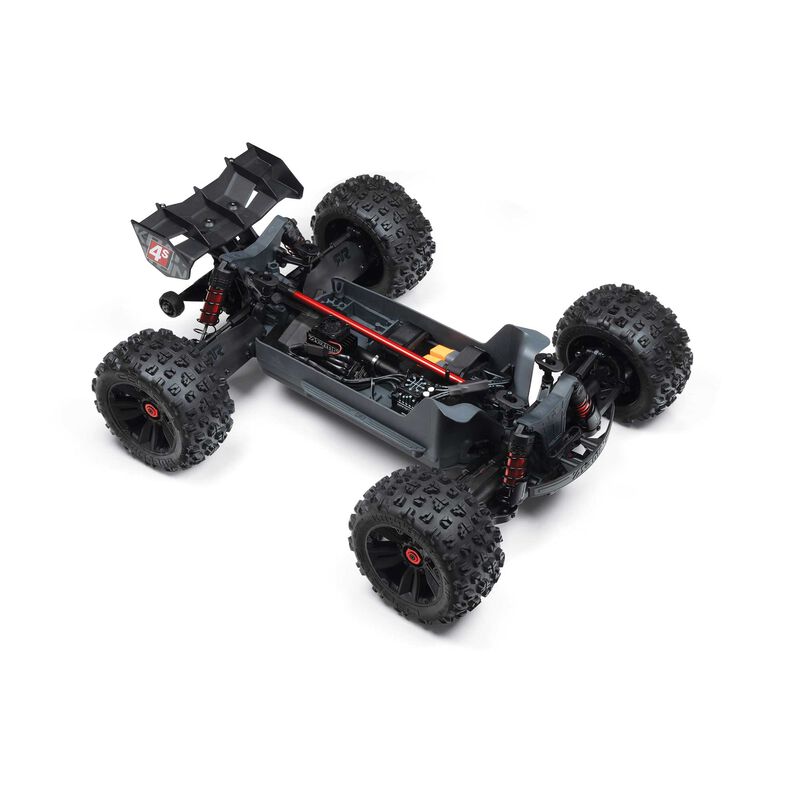 ARRMA 1/10 Kraton 4S 4X4 RTR brushless speed truck on rugged terrain, showcasing its off-road design and durable build.