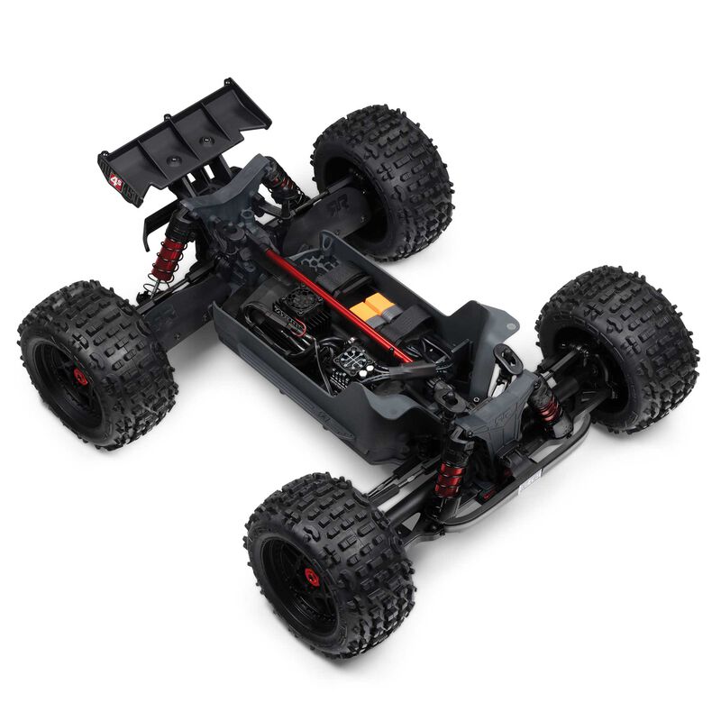 ARRMA Outcast 4X4 4S 1/10th scale 4WD stunt truck with rugged design and large tires for off-road action.