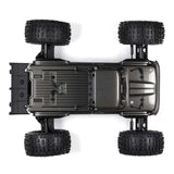 ARRMA Outcast 4X4 4S 1/10th scale 4WD stunt truck shown on rugged terrain, featuring bold design and off-road tires.