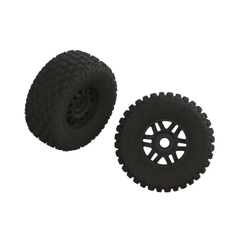 Pair of ARRMA dBoots Fortress LP tires in black, glued for off-road RC vehicles, shown mounted on wheels.