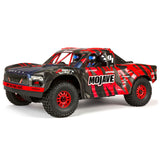 ARRMA Mojave 6S 4x4 RTR brushless short course truck, showing its rugged off-road design and detailed body in a dynamic setting.