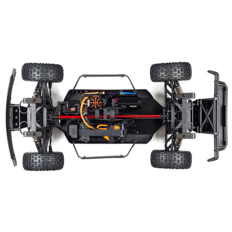 ARRMA Mojave 6S 4x4 RTR brushless short course truck, showing its rugged off-road design and bright orange body with large tires.