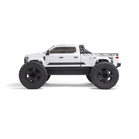 ARRMA 1/7 Big Rock 6S 4WD BLX RTR monster truck with large tires, bright orange body, and detailed rugged design.
