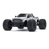 ARRMA 1/7 Big Rock 6S 4WD BLX RTR monster truck with rugged tires and vibrant paint, ready for off-road adventures.