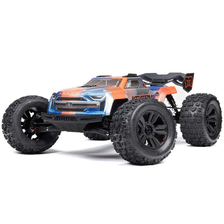 ARRMA 1/8 Kraton 6S BLX V6 4X4 remote control monster truck on rugged terrain, showcasing its powerful design and off-road tires.