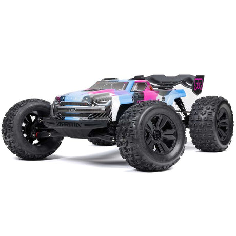 ARRMA 1/8 Kraton 6S BLX V6 4x4 RTR remote control car on rugged terrain, showcasing its durable build and powerful design.