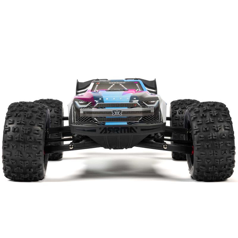 ARRMA 1/8 Kraton 6S BLX V6 4X4 RTR RC car on rugged terrain, showcasing its powerful design and off-road capabilities.
