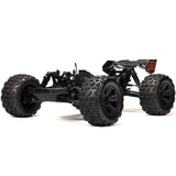 ARRMA 1/8 Kraton 6S BLX V6 4x4 remote control monster truck on rugged terrain, showcasing its powerful design and vibrant color.