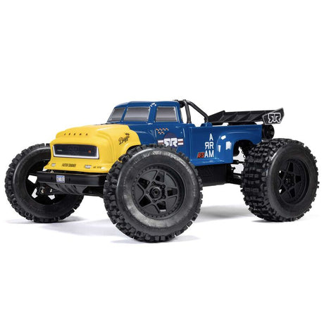 ARRMA 1/8 Notorious 4X4 6s BLX brushless V6 stunt truck RTR on rugged terrain, showcasing its powerful off-road design.