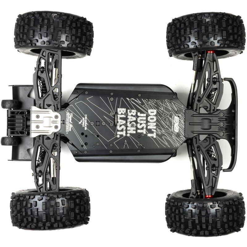 ARRMA 1/8 Notorious 4X4 6s BLX V6 stunt truck with brushless motor on rugged terrain, showcasing its powerful off-road design.