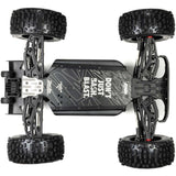 ARRMA 1/8 Notorious 4X4 6s BLX V6 stunt truck with brushless motor on rugged terrain, showcasing its powerful off-road design.