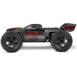 ARRMA 1/8 Kraton 6S EXB 4X4 RTR RC monster truck on rugged terrain, showcasing its aggressive design and bright orange body.