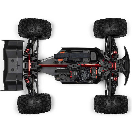 ARRMA 1/8 Kraton 6S EXB 4x4 RTR RC car on rugged terrain, showcasing the powerful off-road vehicle with detailed design.