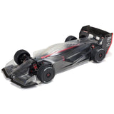 ARRMA 1/7 Limitless 6S 4x4 brushless RC car on a track, showcasing its sleek design and high-performance features.