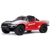 ARRMA 1/10 Senton 4X4 223S BLX RTR short course truck with blue body and off-road tires, displayed on a track.