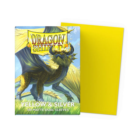 Dragon Shield yellow and silver dual matte standard card sleeves, featuring vibrant colors and smooth matte finish for card protection.