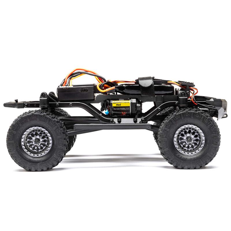 Axial 1/24 scale Lexus GX 470 4x4 RC rock crawler with brushed motor, detailed exterior, and off-road tires.