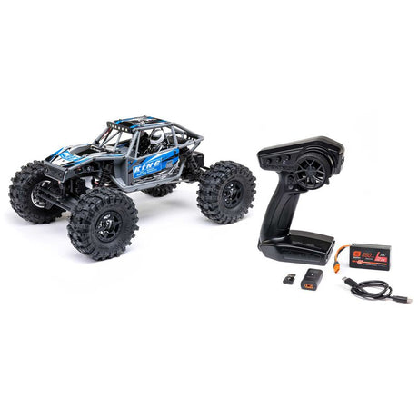 Axial 1/18 scale UTB18 Capra 4WS 4X4 RTR brushed rock crawler with detailed chassis and rugged tires.