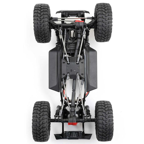 Axial 1/10 SCX10 III Coyote 4x4 RTR brushed rock crawler showing detailed chassis and rugged tires in outdoor terrain