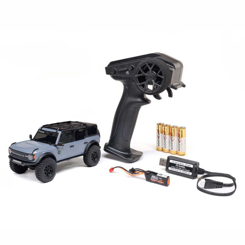 Axial 1/30 scale Ford Bronco 4x4 RC rock crawler with brushed motor, detailed exterior, and off-road tires.