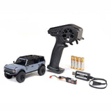 Axial 1/30 scale Ford Bronco 4x4 RC rock crawler with brushed motor, detailed exterior, and off-road tires.