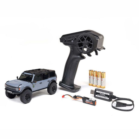 Axial 1/30 scale Ford Bronco 4x4 RC rock crawler with brushed motor, detailed exterior, and off-road tires.