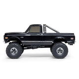 Axial 1/30 scale SCX30 Chevrolet K10 4x4 brushed rock crawler vehicle on rough terrain